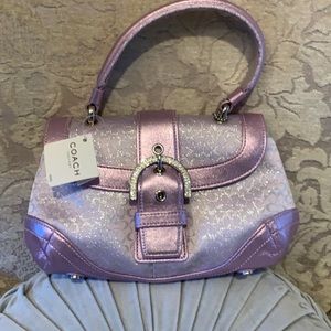 Coach pink mini handbag , rhinestone accented buckle new with tags smoke free